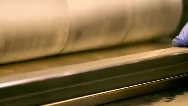 Metal grinding close-up. Big machine work with copper plates — Stock Video