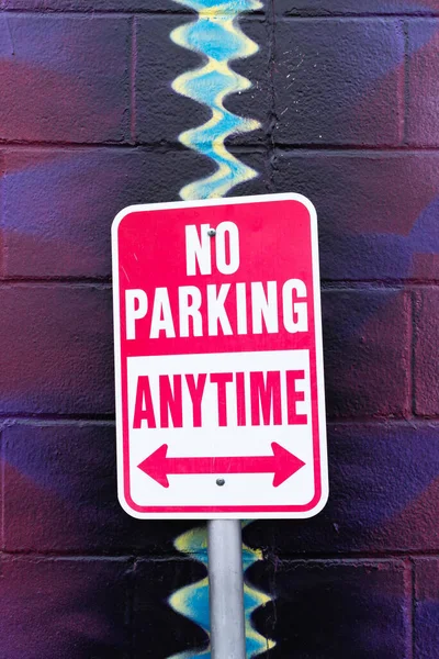 Parking Anytime Sign Colorful Painted Block Wall Background — Stock Photo, Image