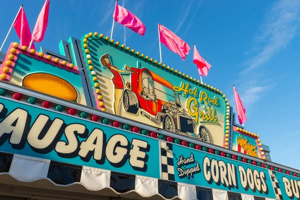 Generic carnival food vender at fair in small town.