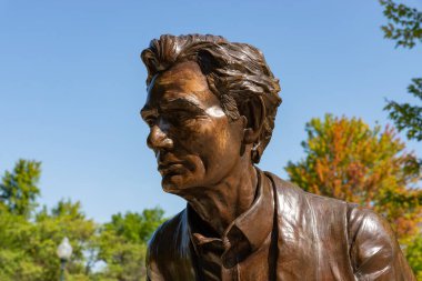 Lockport, Illinois - United States - August 23rd, 2022: Lincoln in Three Poses bronze statue, by sculptor David Ostro, at the Lincoln Landing in Lockport, Illinois.