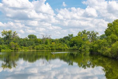 Krueger Quarry Lake on a beautiful Summer afternoon in Lemont, Illinois.