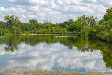 Krueger Quarry Lake on a beautiful Summer afternoon in Lemont, Illinois.