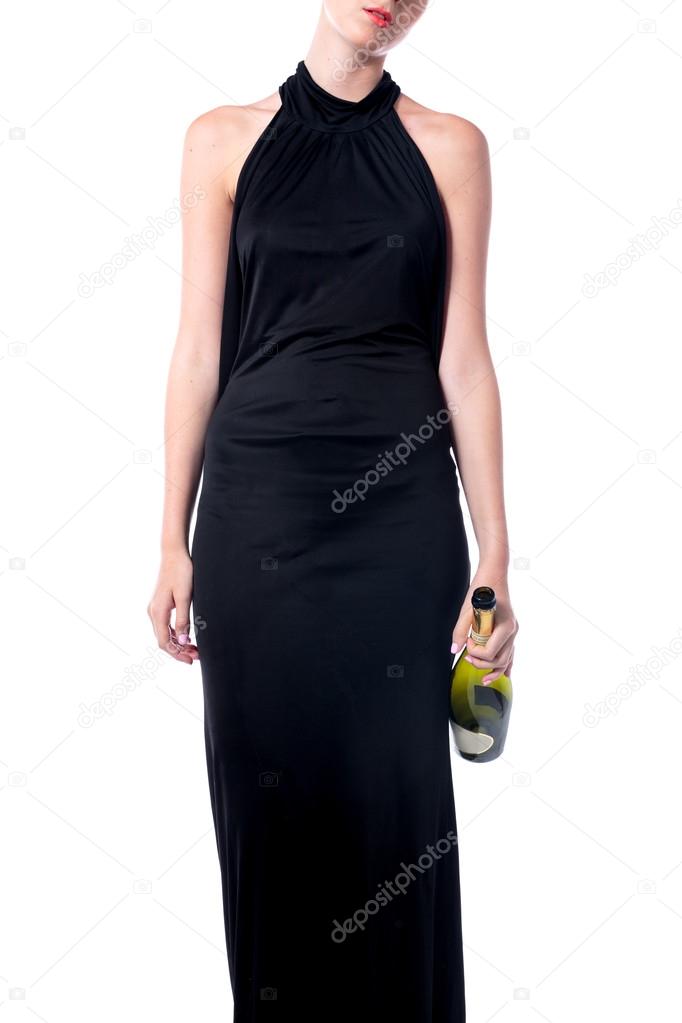 Elegant party woman with a bottle of wine