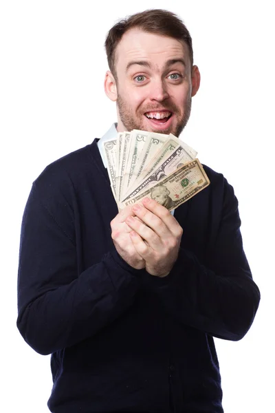 Excited man holding a fistful of money — Stock Photo, Image