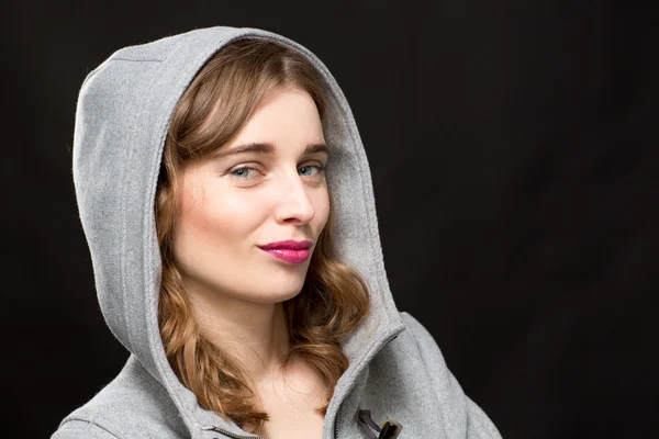 Girl Wearing Hood Smirking — Stock Photo, Image