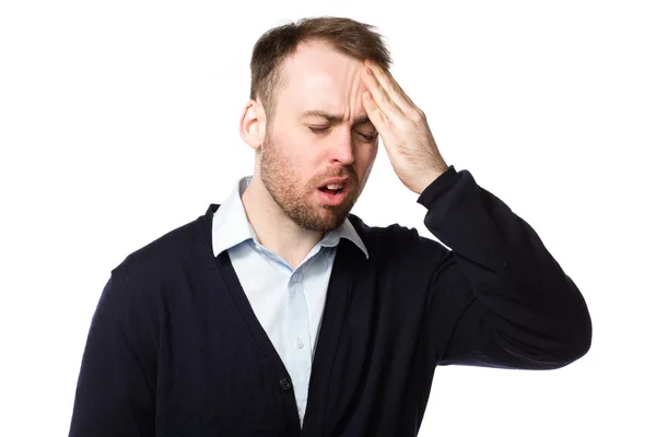 Man rubbing his throbbing forehead with his hand — Stock Photo, Image