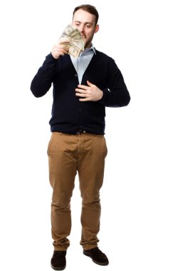 genç adam bir avuç dolusu para contemplating