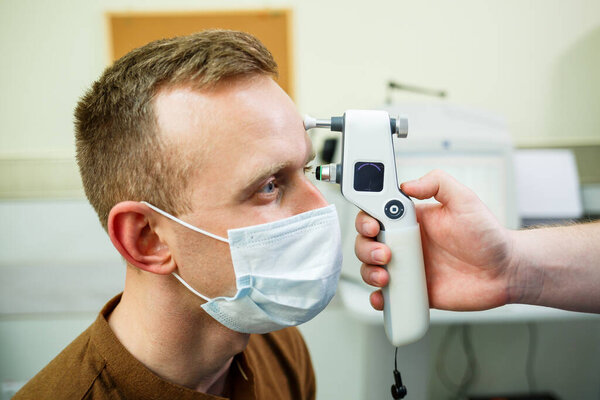 A patient in an ophthalmic hospital. Eye diagnostics in a modern hospital.