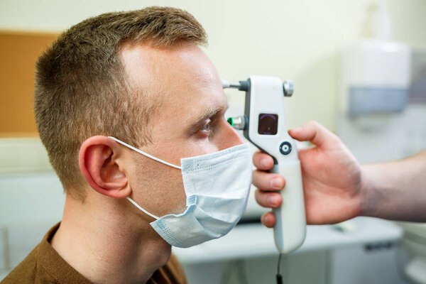 A patient in an ophthalmic hospital. Eye diagnostics in a modern hospital.