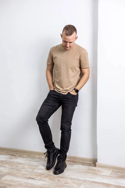 Stylish Young Man Beige Shirt Black Jeans Boots Natural Black — 스톡 사진