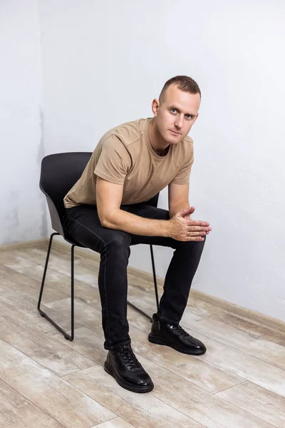 Stylish Young Man Beige Shirt Black Jeans Boots Natural Black — Zdjęcie stockowe