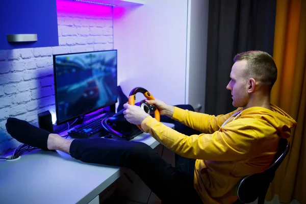 Male Gamer Playing Racing Games Computer Uses Steering Wheel Emotional — Stock Photo, Image