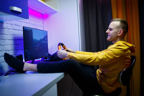 Male Gamer Playing Racing Games Computer Uses Steering Wheel Emotional — Stock Photo, Image