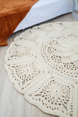 El yapımı el yapımı bej iplik halı, dokuma deseni, kırsal gelenekler, örgü sanatı.