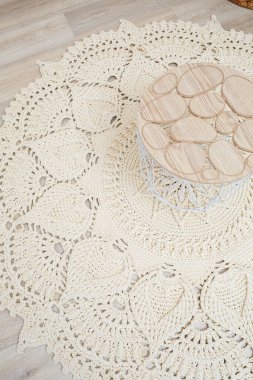 El yapımı el yapımı bej iplik halı, dokuma deseni, kırsal gelenekler, örgü sanatı.