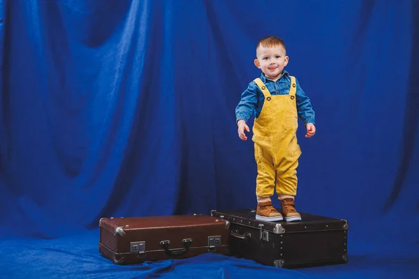 Ukrainian Boy Years Old Yellow Overalls Plays Suitcases Modern Child — Stock Photo, Image