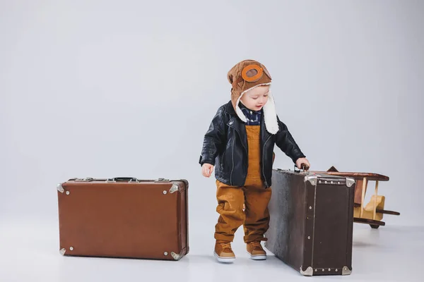 Happy Boy Helmet Pilot Jacket Carries Brown Suitcase Portrait Child — Stock Photo, Image