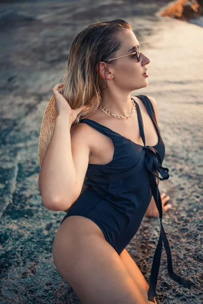 Young Woman Sunglasses Resting Sea Slender Black Swimsuit Selective Focus — Stock Photo, Image