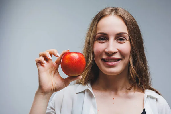 Cute Brunette Woman White Shirt Holding Red Apple Hand Standing — Fotografia de Stock