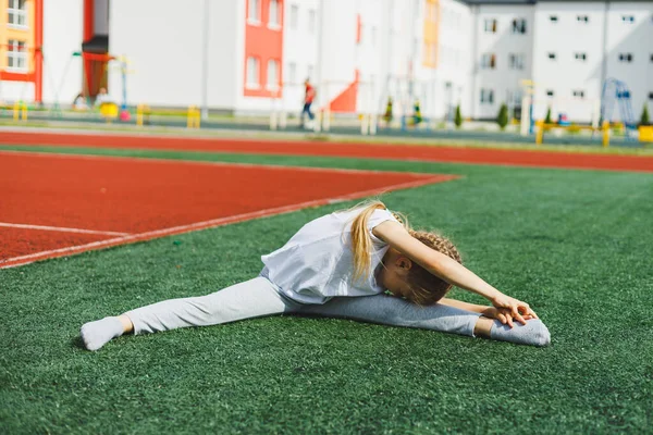 Cheerful Girl Years Old Sunny Lies Grass Park Child Stretches — Fotografia de Stock