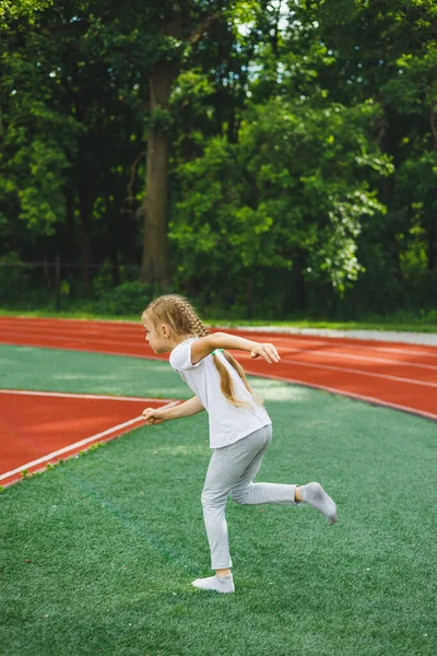 Little Girl Goes Sports Grass Child Does Warm Training Stadium — Foto de Stock