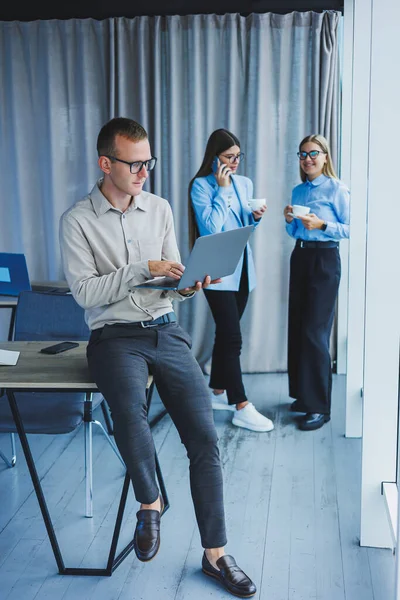 Group of business people working together in the office. Working day with colleagues in the office. Business people in the office. Selective focus