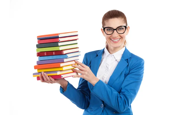 Happy woman presenting stack of books