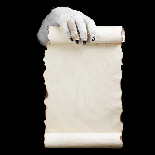 Mummie in handen houdt manuscript — Stockfoto