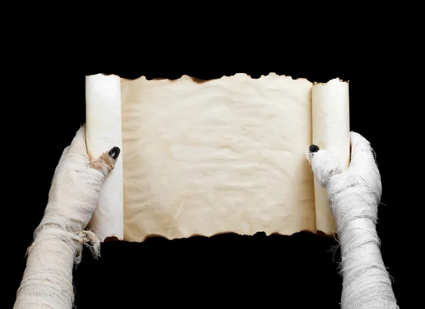 Mummy in hand keeps manuscript — Stock Photo, Image