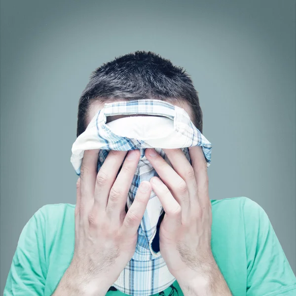 Male covered his face with a cap — Stock Photo, Image