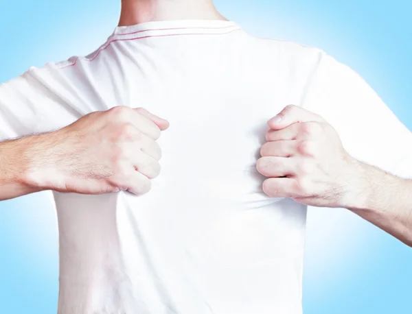 Man showing white t-shirt — Stock Photo, Image