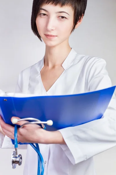 Woman doctor looks forward — Stock Photo, Image