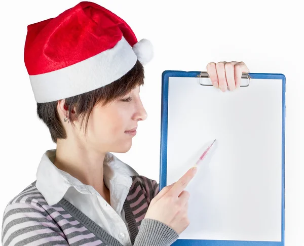 Woman in Santa hat showing on whiteboard — Stock Photo, Image