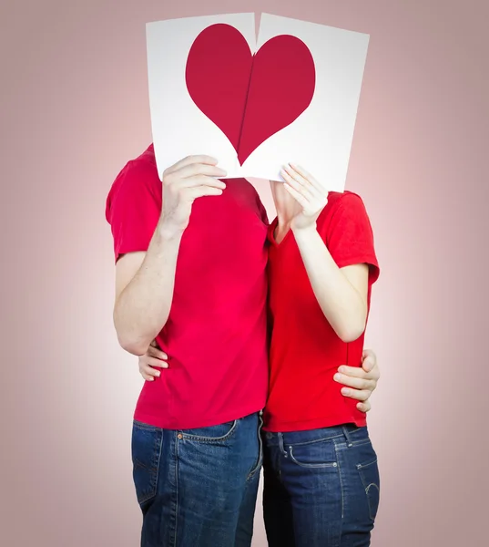 Loving couple with heart — Stock Photo, Image