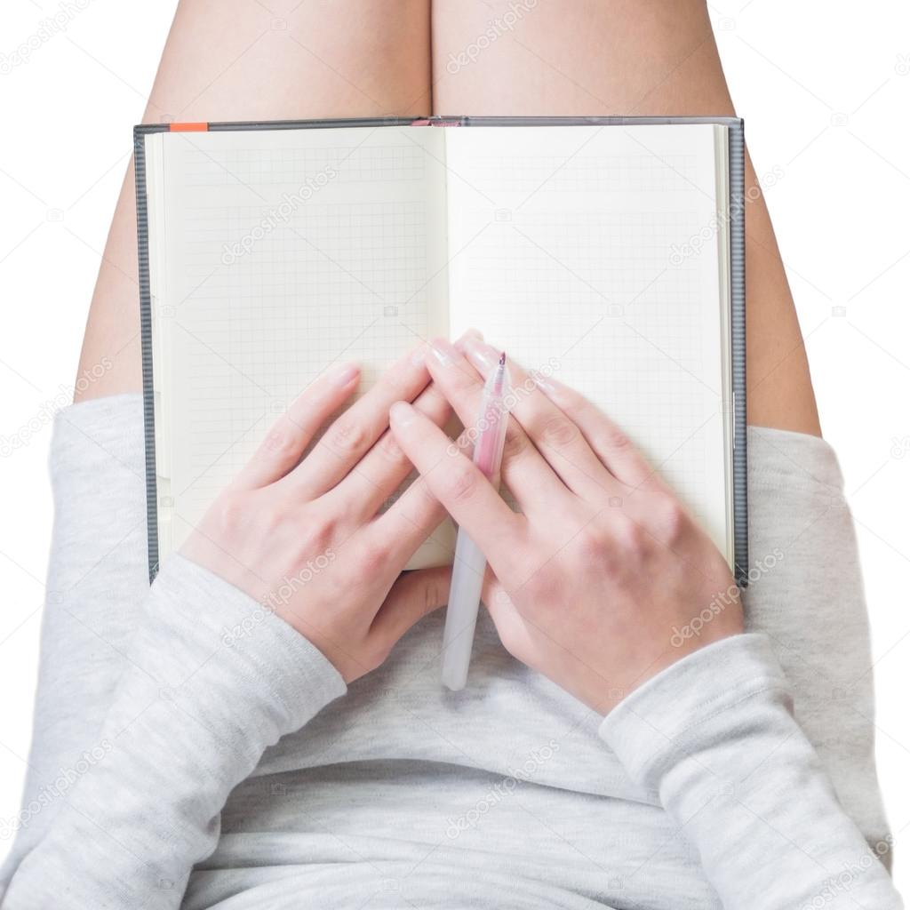 Woman writes in her diary