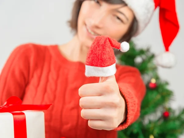 Gesture thumb up in new year — Stock Photo, Image