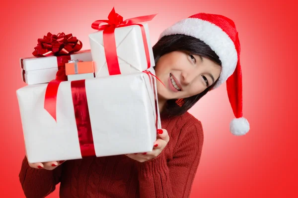 Woman is holding many presents — Stock Photo, Image