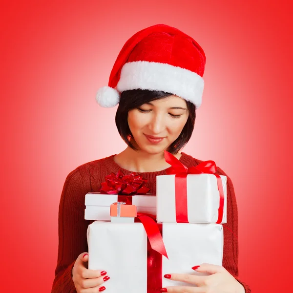 Happy woman is holding presents — Stock Photo, Image