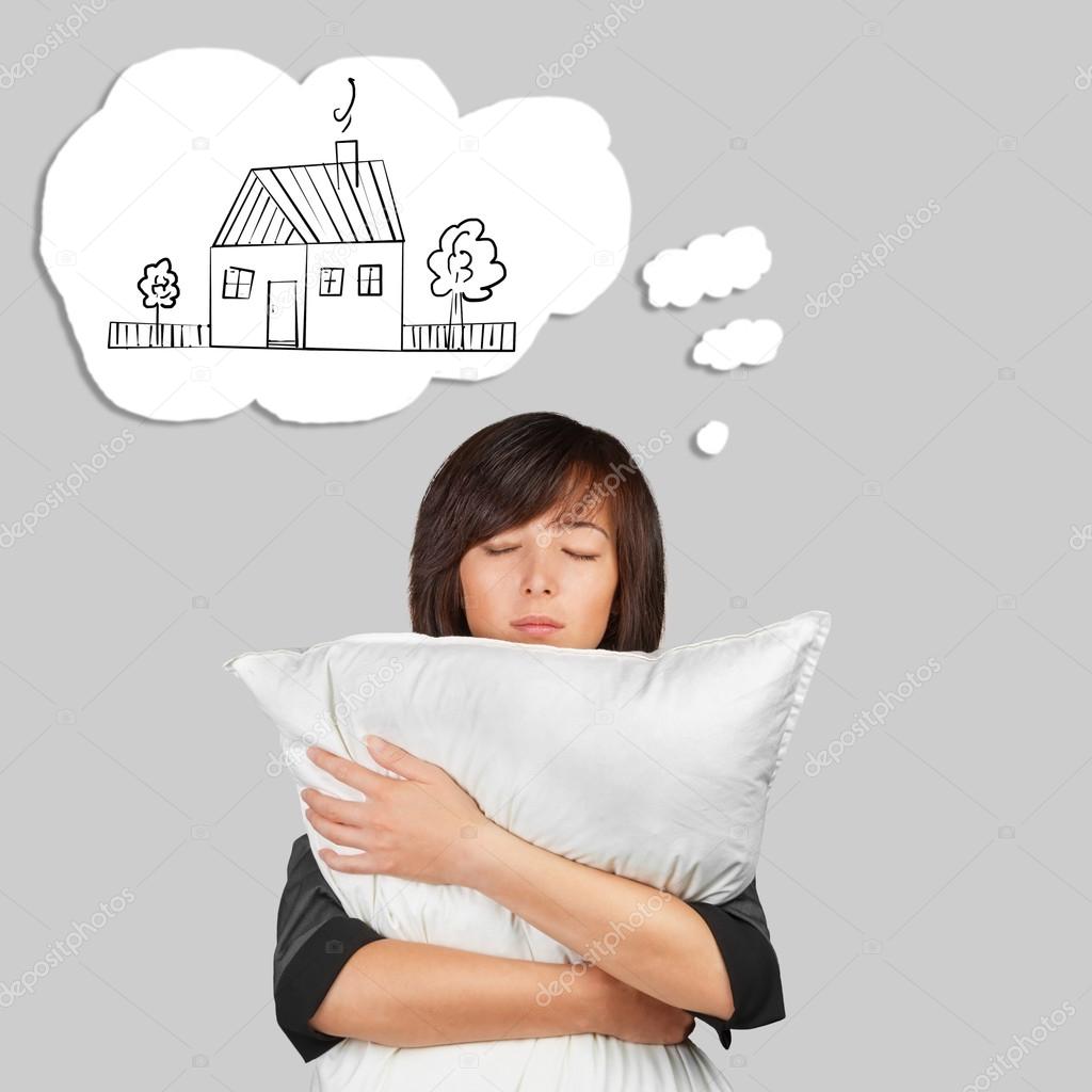 Woman is dreaming about home