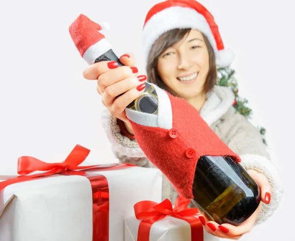 Woman is giving a bottle of champagne — Stock Photo, Image