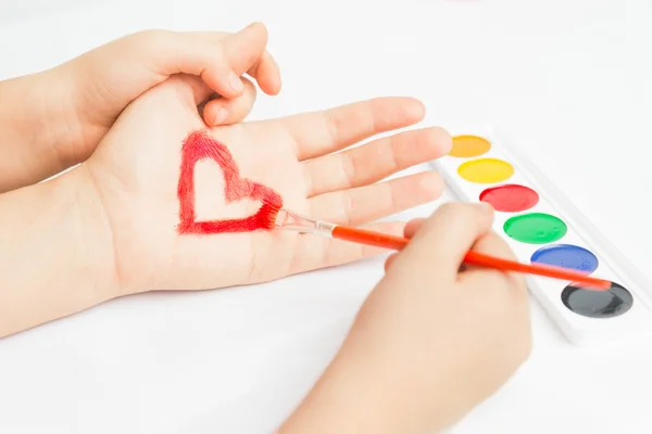 Painted heart on hand — Stock Photo, Image