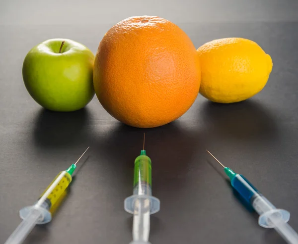 Genetic manipulation with fruits — Stock Photo, Image