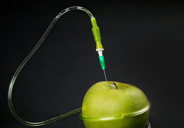 Grønn eple og droppteller – stockfoto