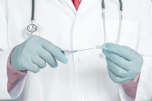 Doctor with syringe — Stock Photo, Image