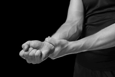 Pain in a male wrist, monochrome image clipart