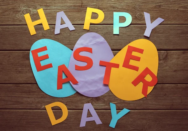 Text happy Easter day on paper eggs — Stock Photo, Image