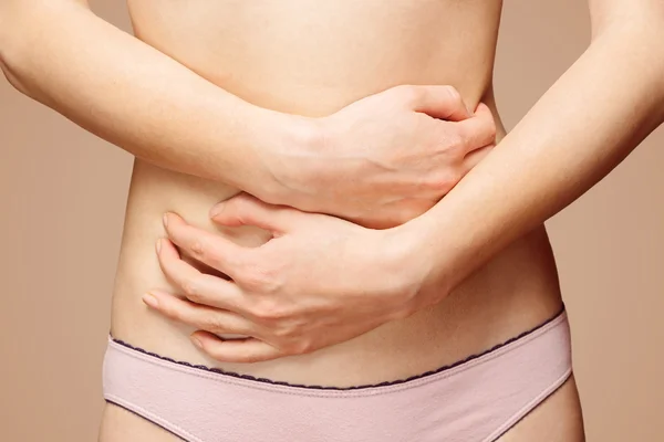 Pain in the female abdomen — Stock Photo, Image