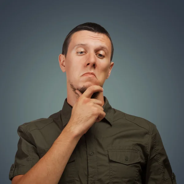 Portrait of pensive man — Stock Photo, Image