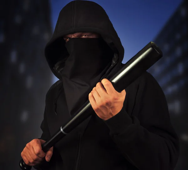 Dangerous man with bat — Stock Photo, Image