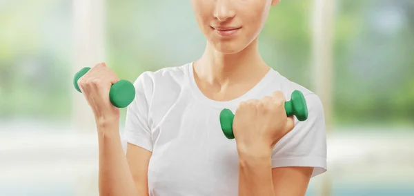 Fitness woman with dumbbells — Stock Photo, Image